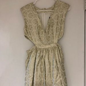 Gold dress with cutout sides